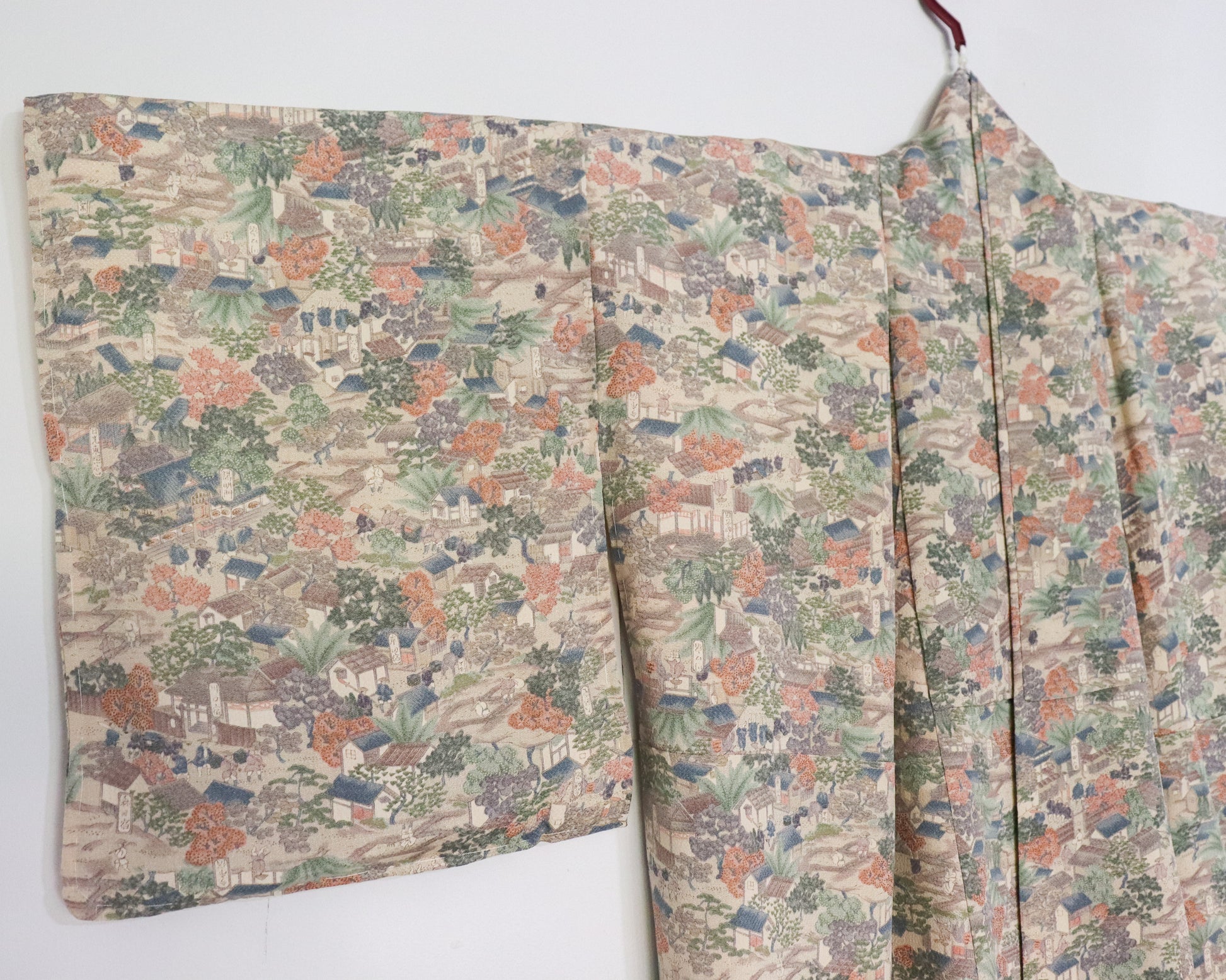 vintage silk kimono with unique pattern of people, buildings and nature.  kimono sleeve.