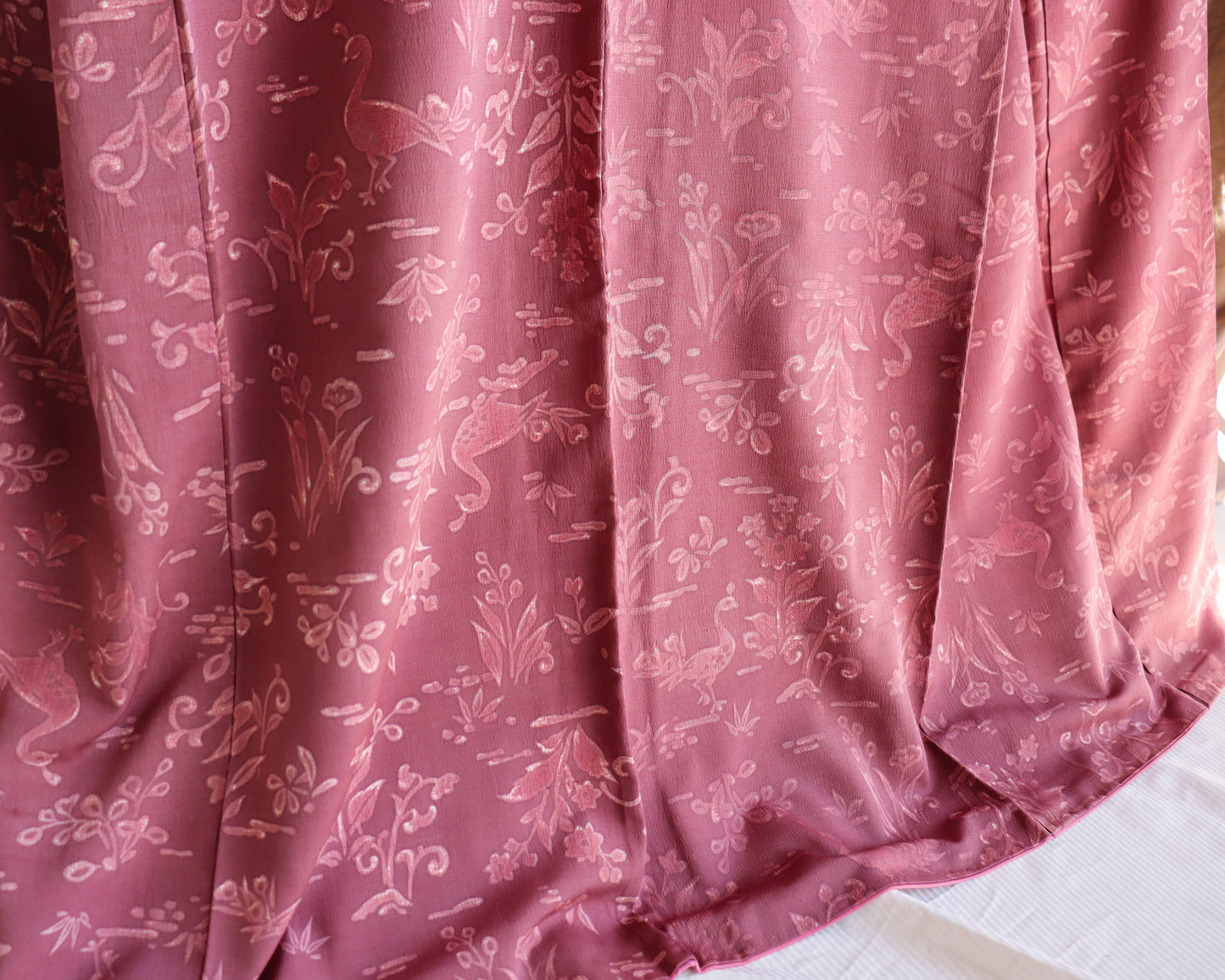 Vintage silk kimono in pink and purple. retro nature pattern.