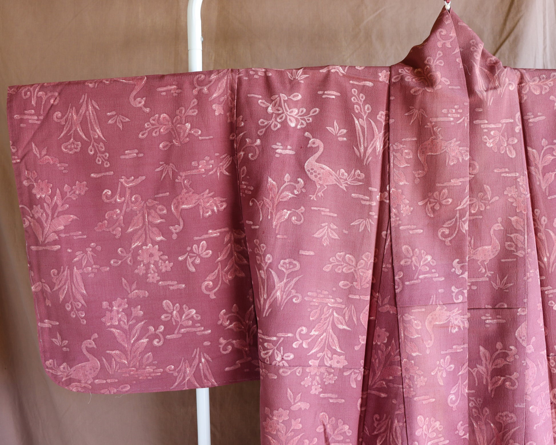Vintage silk kimono in pink and purple. retro nature pattern.