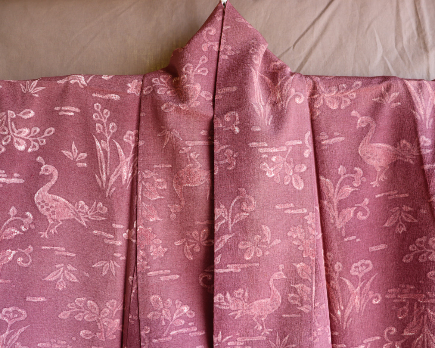 Vintage silk kimono in pink and purple. retro nature pattern.