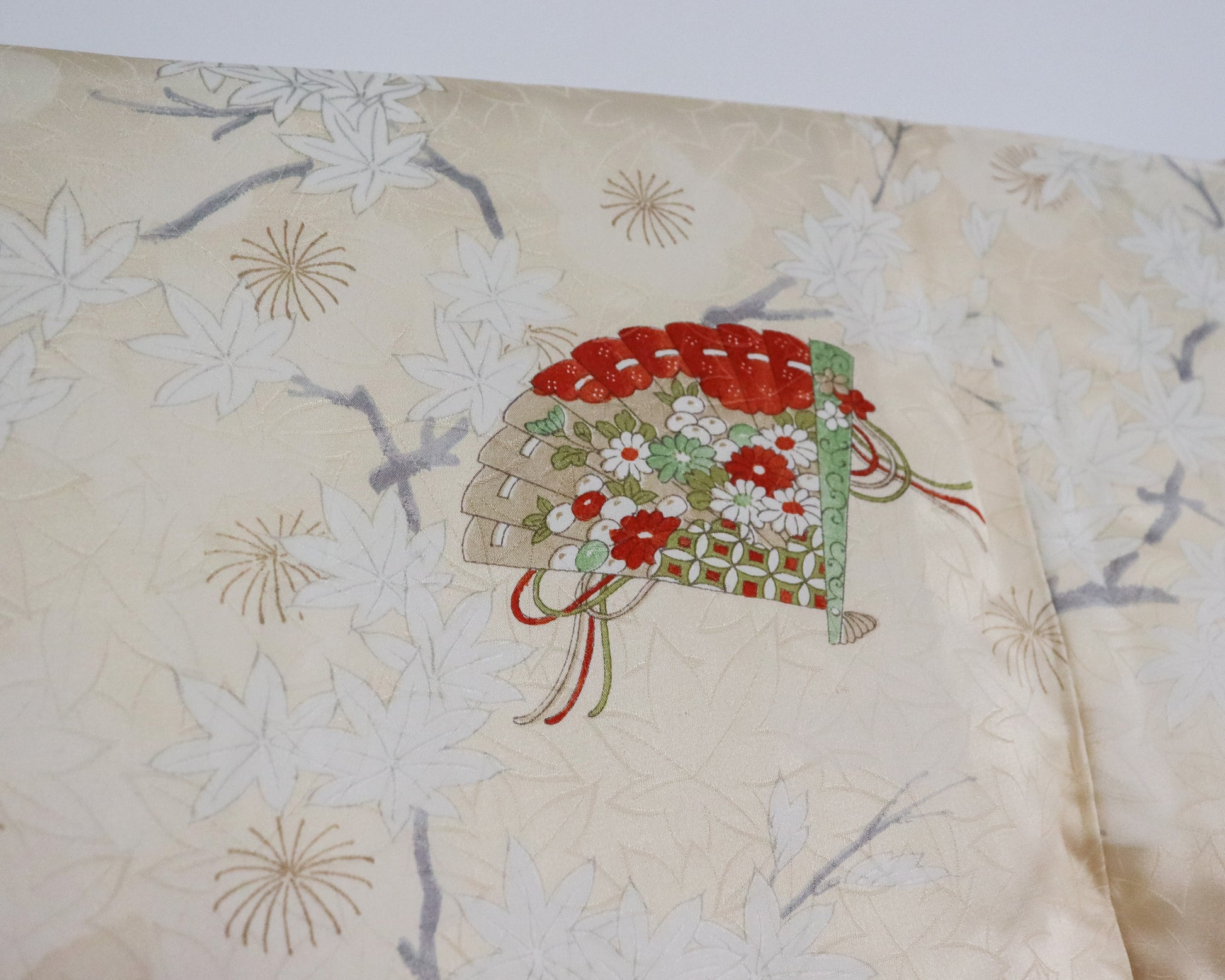 Vintage silk kimono in light yellow. pattern of momiji, flowers and Japanese traditional fan.