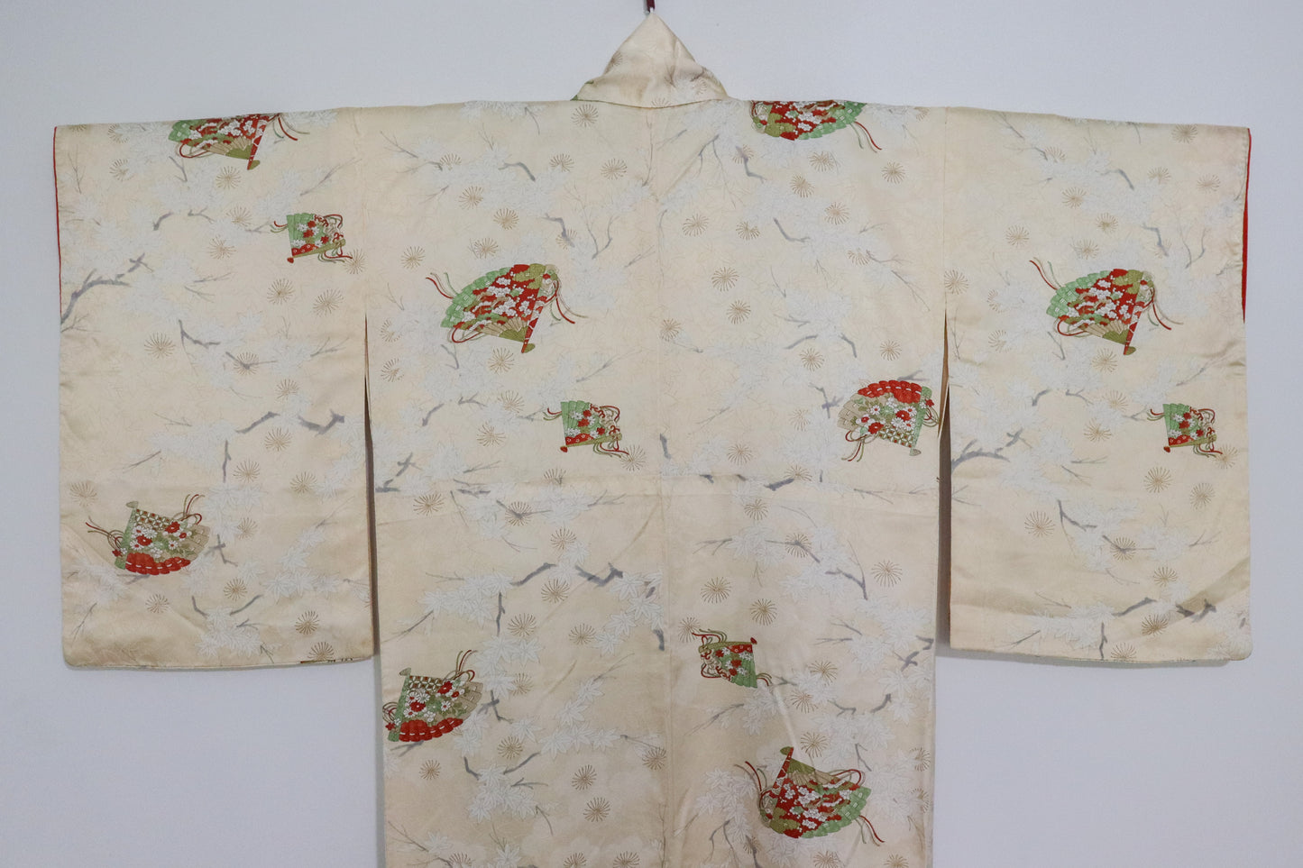 Vintage silk kimono in light yellow. pattern of momiji, flowers and Japanese traditional fan.