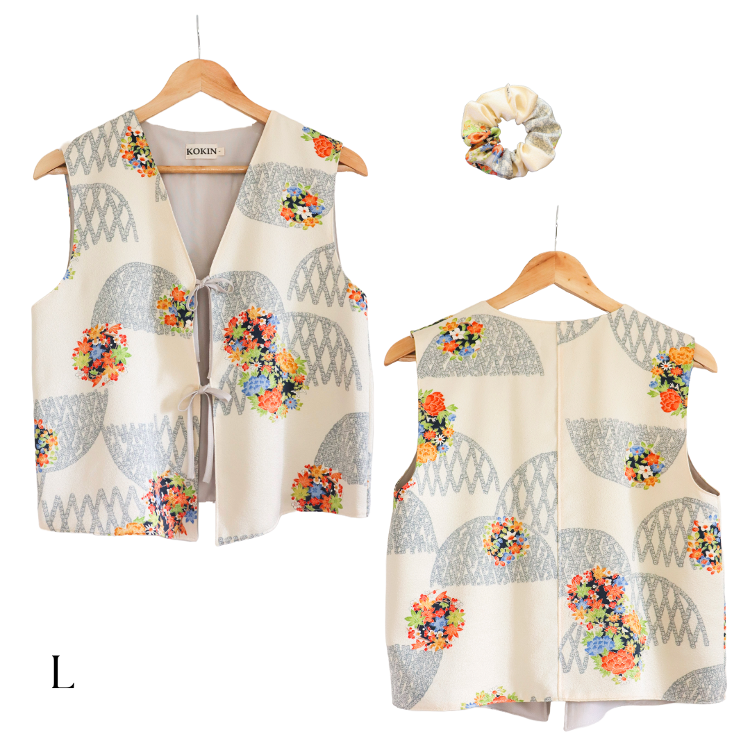Women's front-tie vest tops made from pre-loved silk kimono. Fully lined with deadstock fabric. Trendy summer tops.Size L.