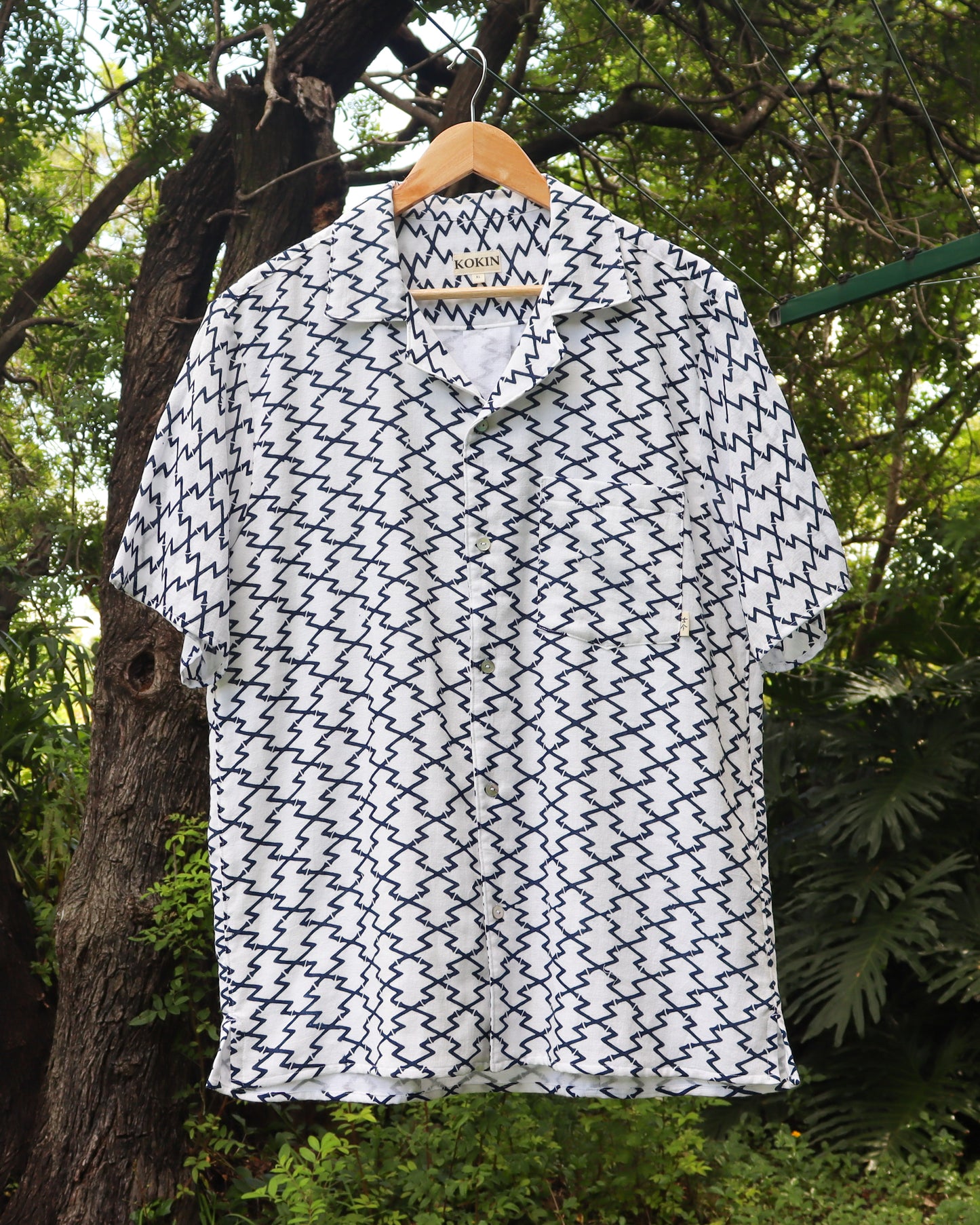Men's summer shirt made from summer kimono (yukata). The soft cotton gauze fabric is very comfortable. On a hanger.