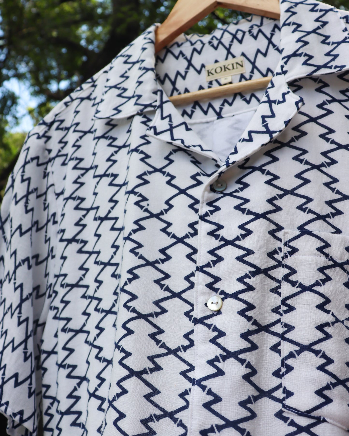 Men's summer shirt made from summer kimono (yukata). The soft cotton gauze fabric is very comfortable. Close up photo of the shell buttons.