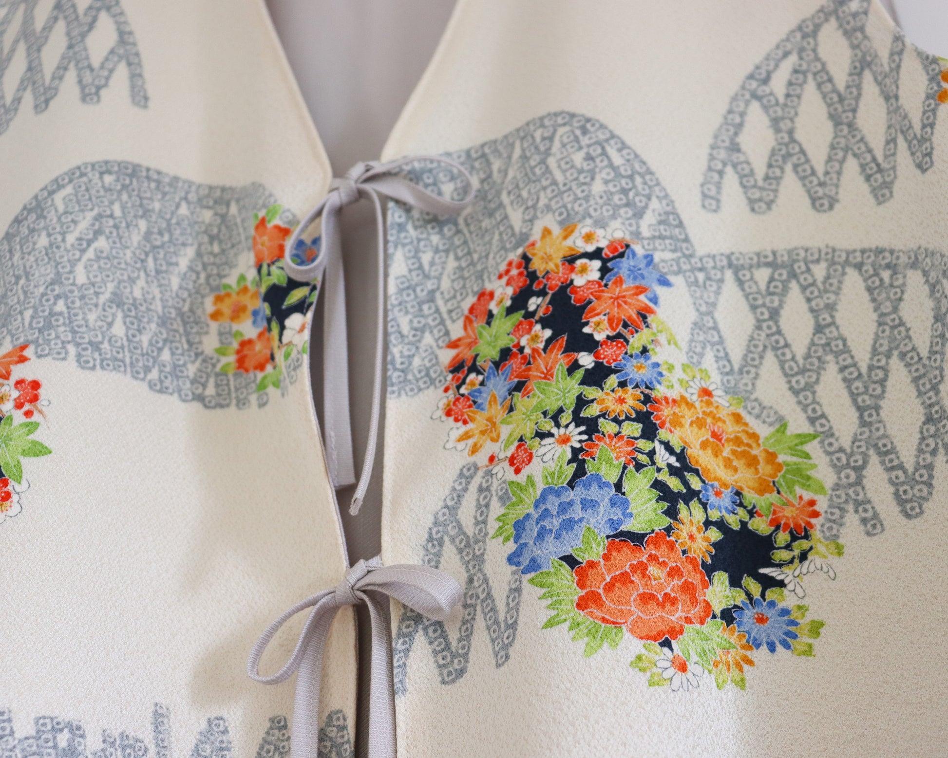 Women's front-tie vest tops made from pre-loved silk kimono. Fully lined with deadstock fabric. Trendy summer tops.