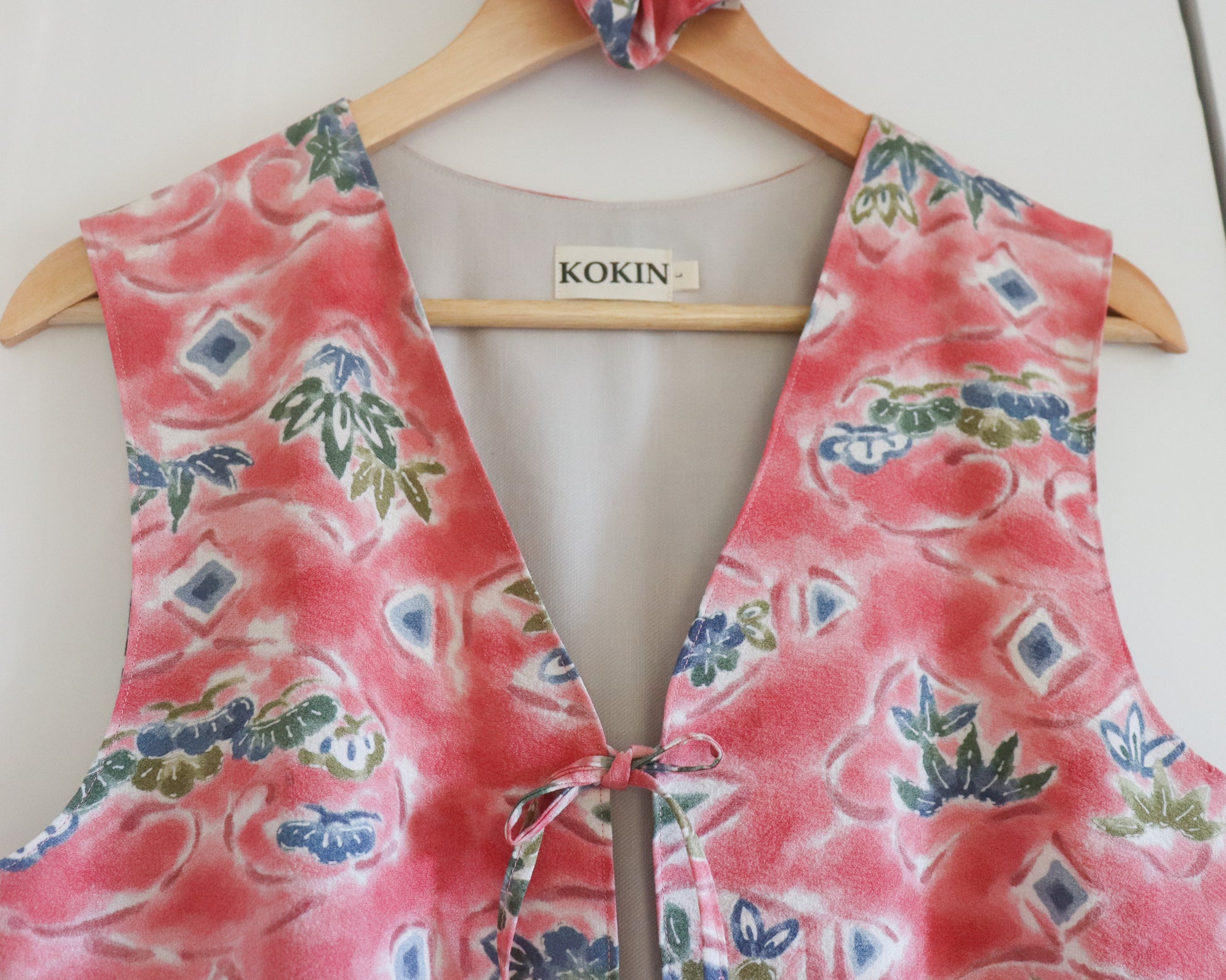 Women's front tie top made from pre-loved silk kimono. Slow fashion. Upcycling. Fully lined with deadstock fabric.