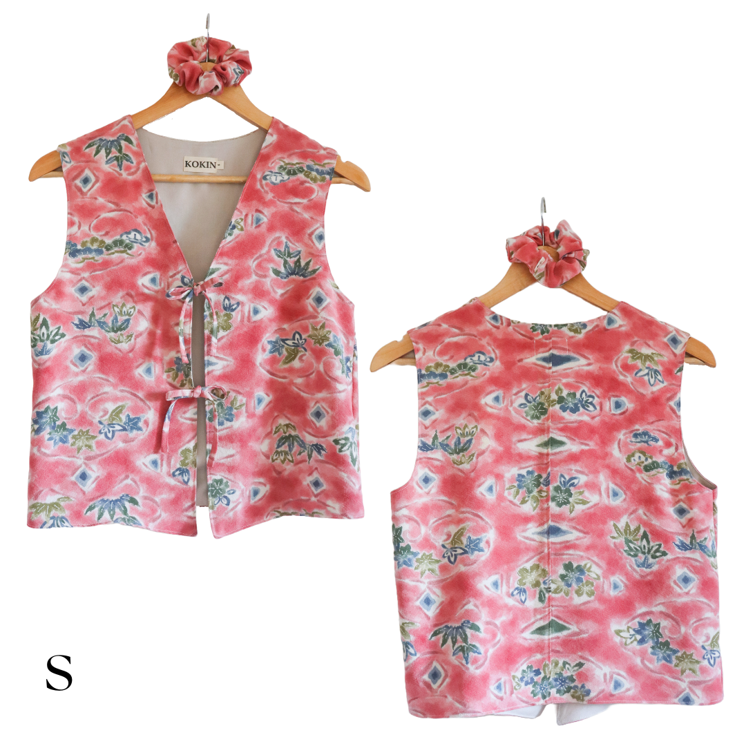 Women's front tie top made from pre-loved silk kimono. Slow fashion. Upcycling. Fully lined with deadstock fabric. Front and back.