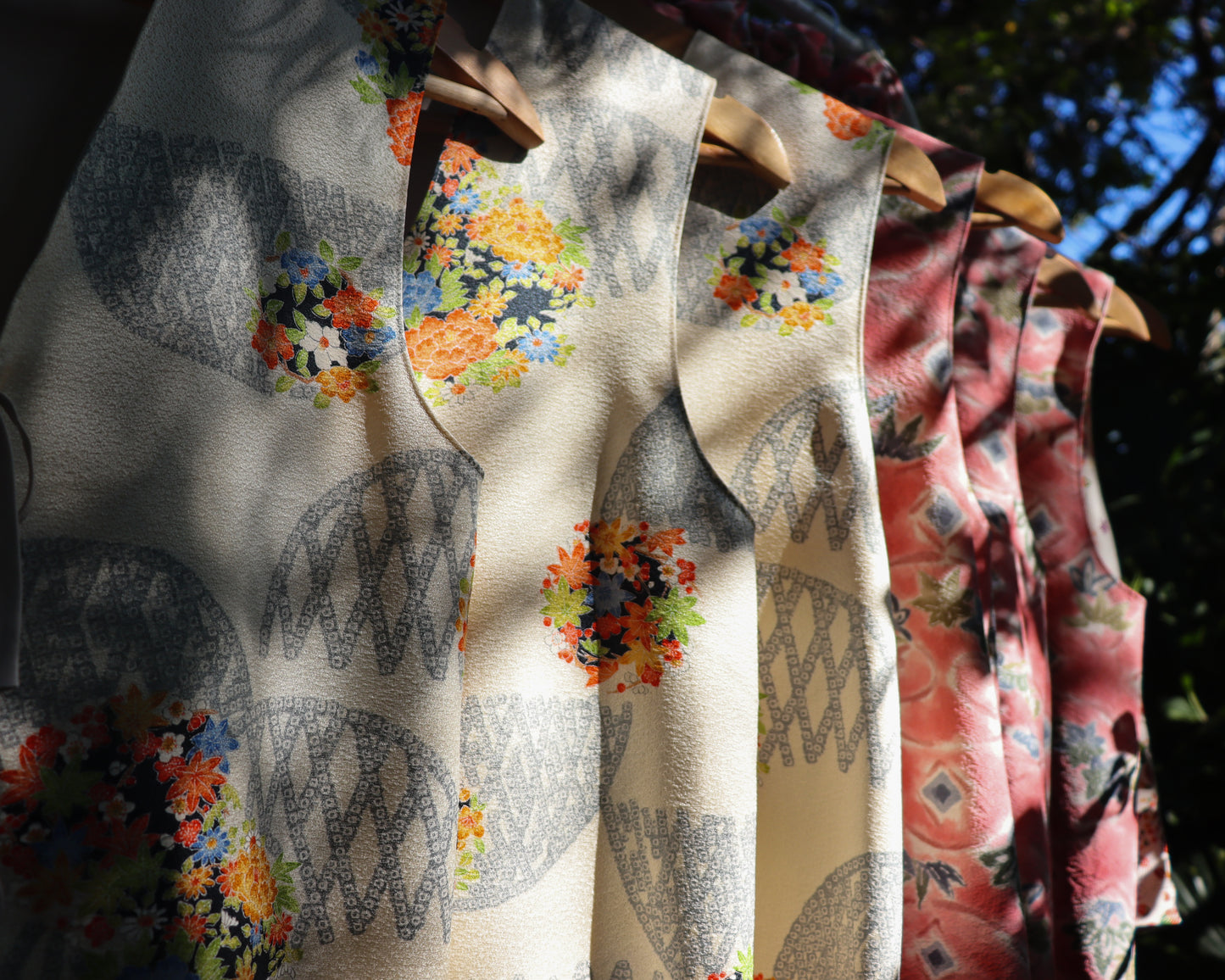 Women's vest tops made from pre-loved silk kimonos. Silk kimono fabrics with the floral patterns.