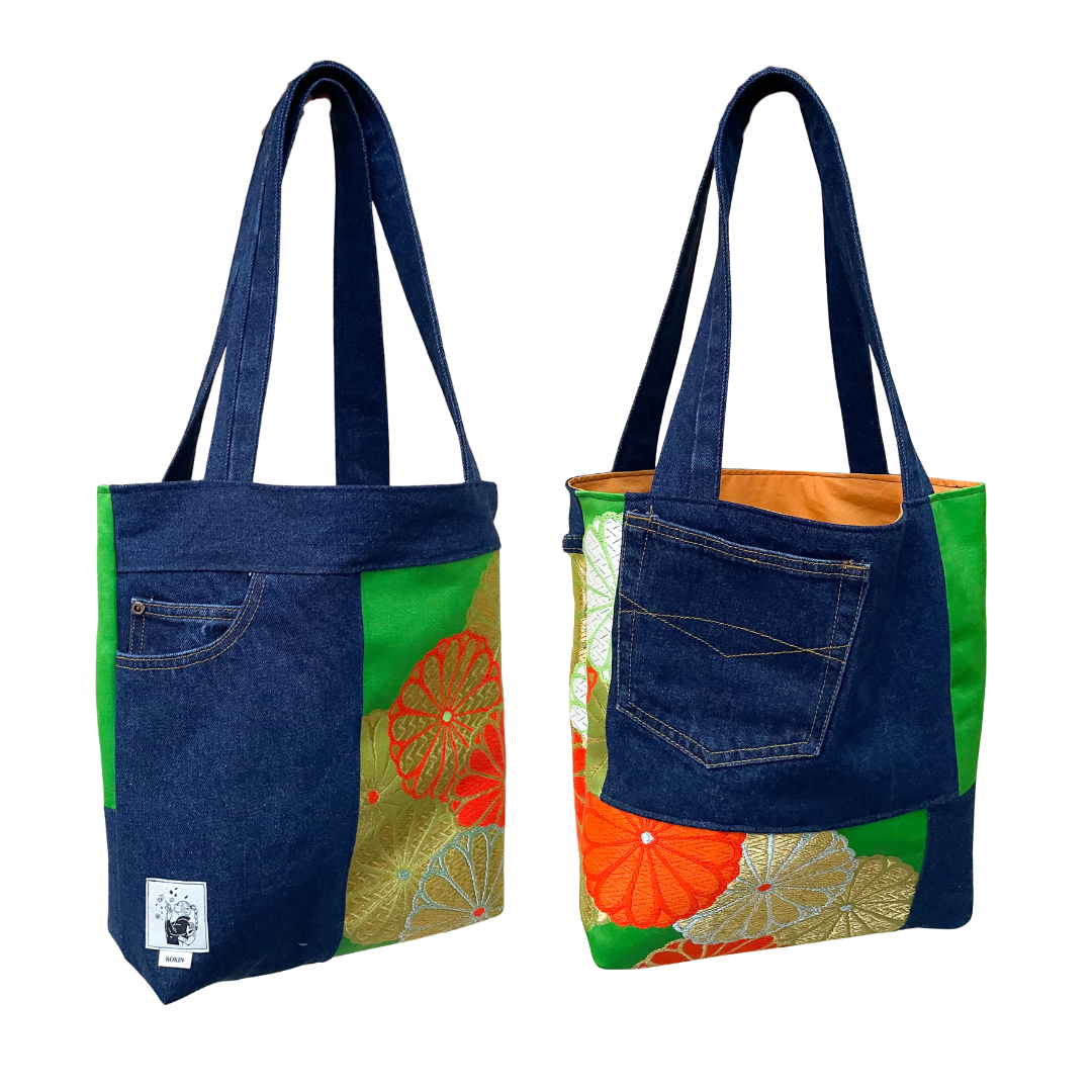 A denim tote bag with denim and floral fabric, one with a visible brand logo.