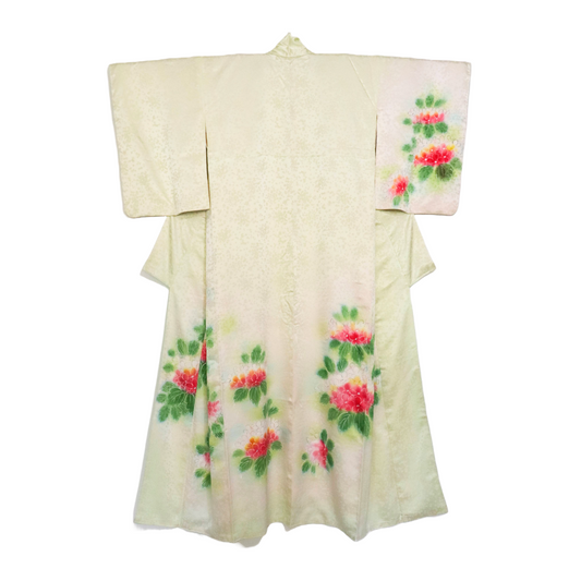 Vintage silk kimono in bright pastel green with floral pattern. Cute flowers.