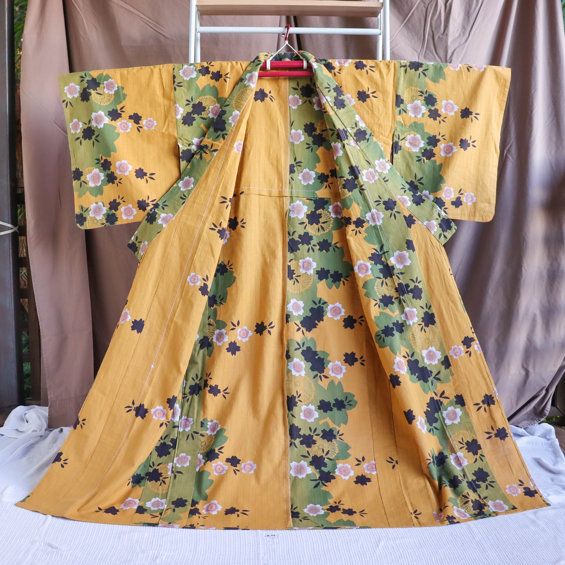 pre-loved yukata: summer cotton kimono. Casual kimono in yellow, with the pattern of cherry blossom.