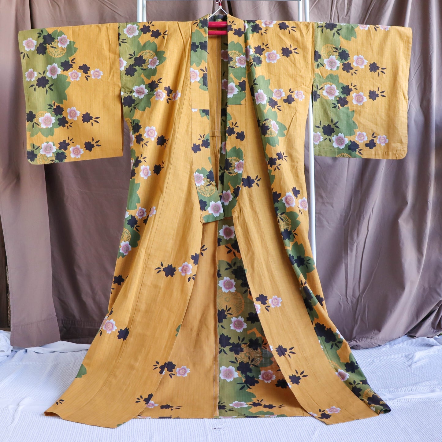 pre-loved yukata: summer cotton kimono. Casual kimono in yellow, with the pattern of cherry blossom.