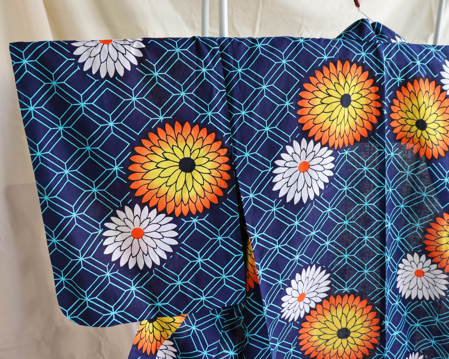 pre-loved yukata. summer cotton kimono in navy with the pattern of flowers. vibrant floral print.