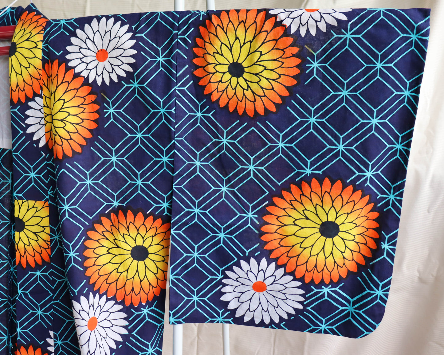 pre-loved yukata. summer cotton kimono in navy with the pattern of flowers. vibrant floral print.