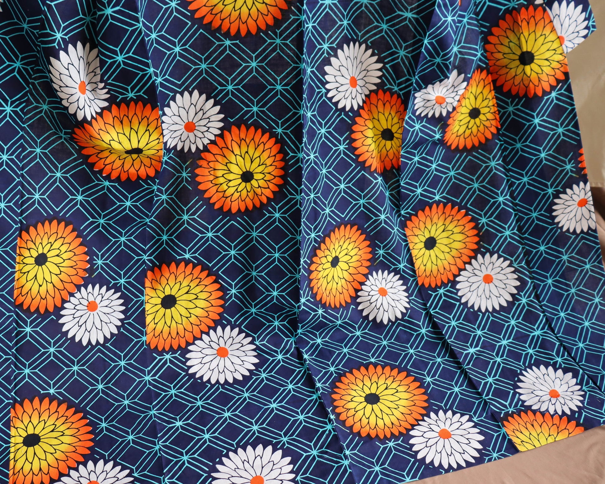 pre-loved yukata. summer cotton kimono in navy with the pattern of flowers. vibrant floral print.