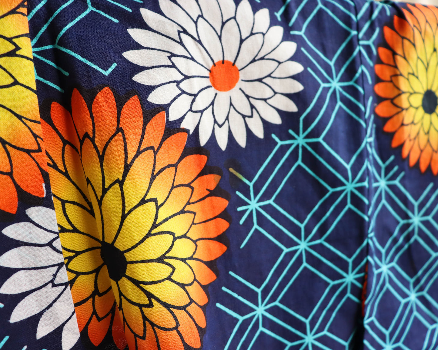 pre-loved yukata. summer cotton kimono in navy with the pattern of flowers. vibrant floral print.