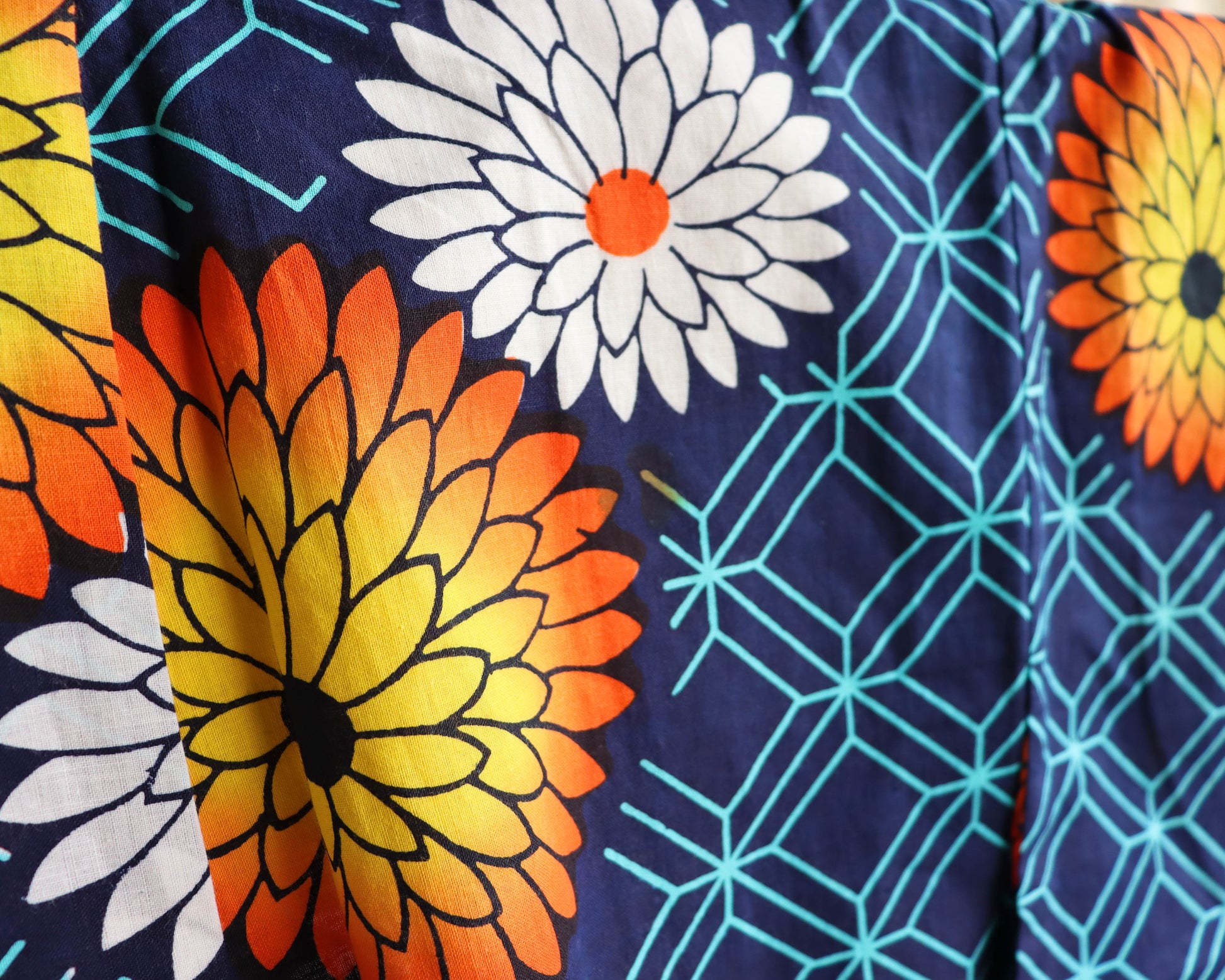 pre-loved yukata. summer cotton kimono in navy with the pattern of flowers. vibrant floral print.