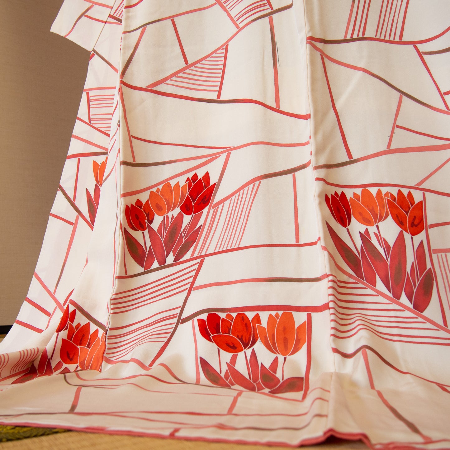 White silk kimono with the pattern of red tulips.