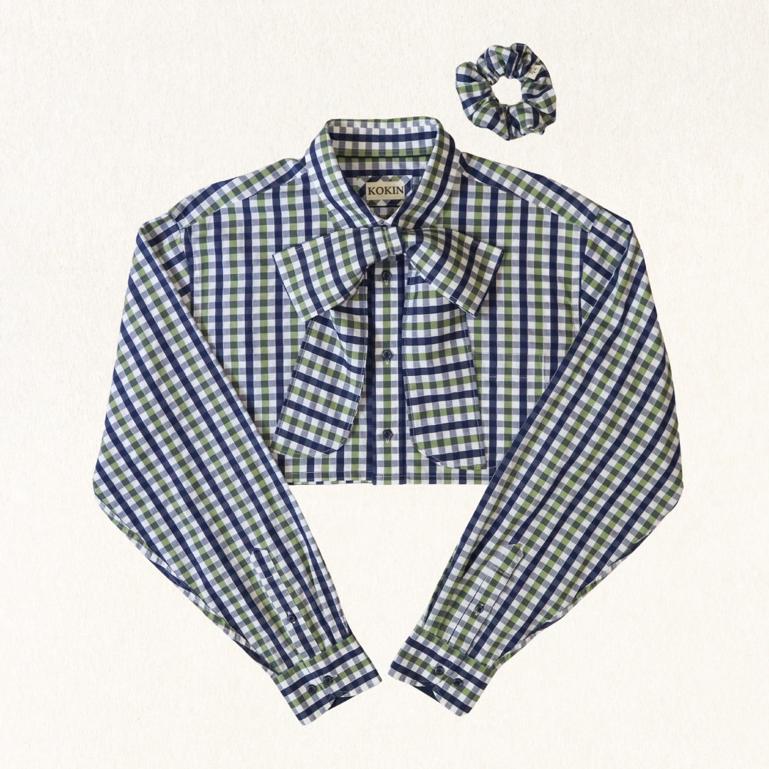 Green and blue checkered shirt with matching scrunchie on a white background