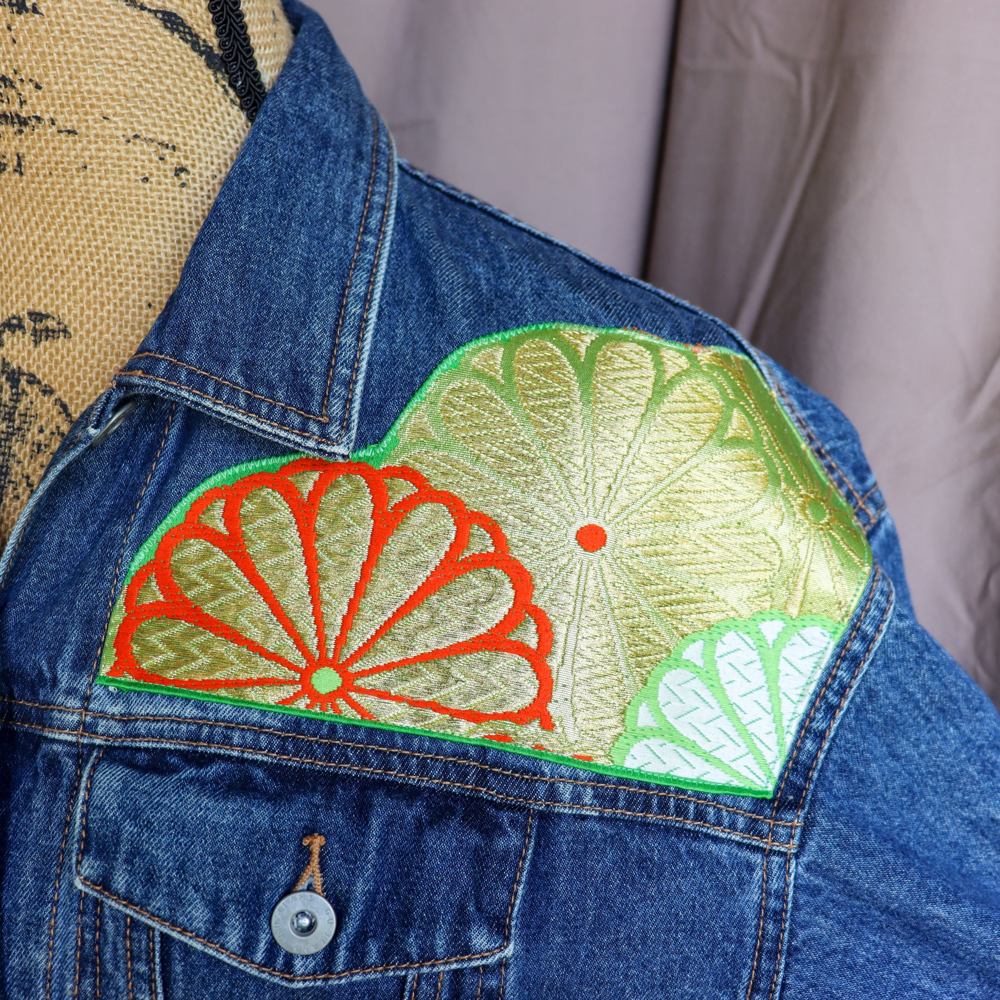 Reworked denim jacket with silk kimono patchworks.