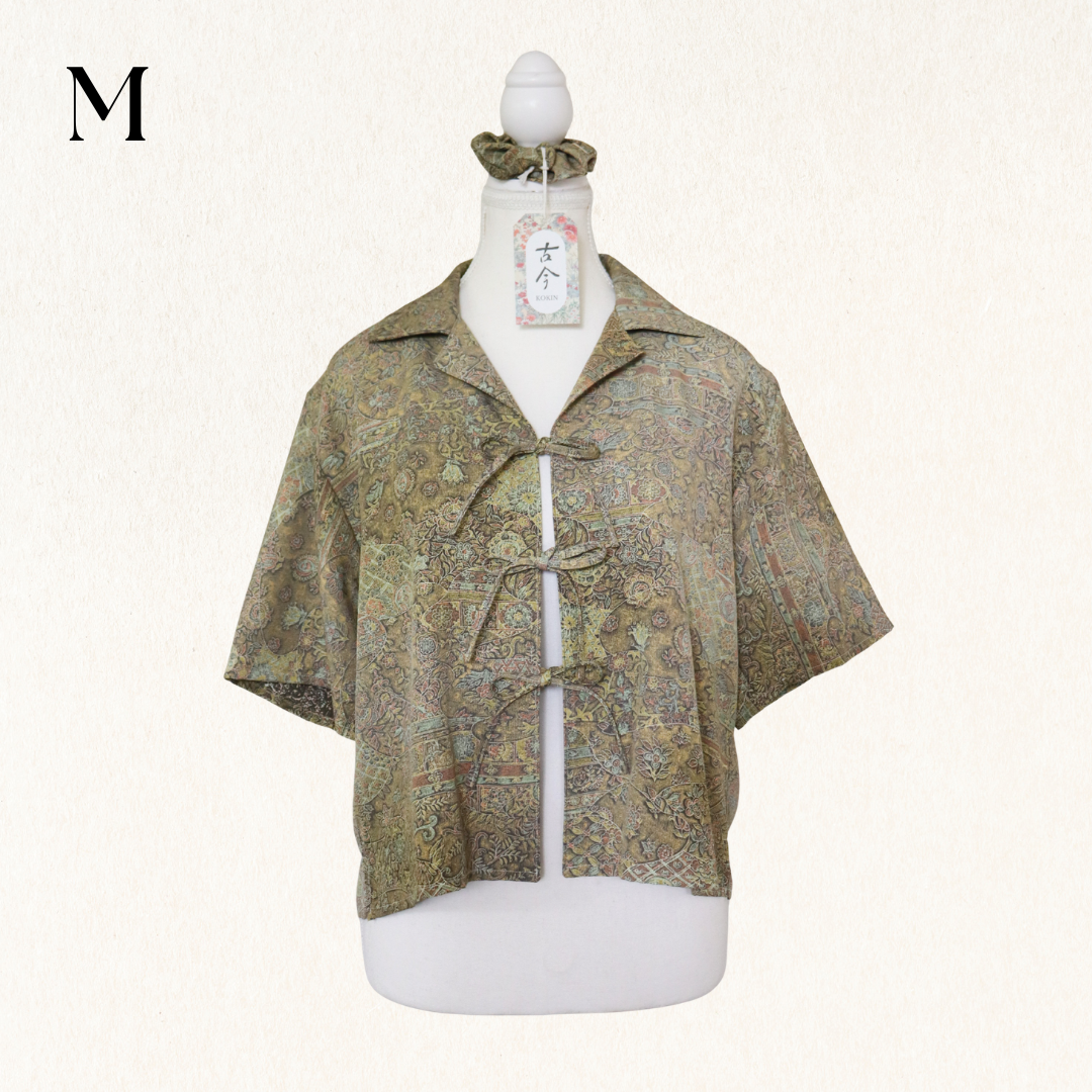 Patterned shirt on a mannequin with a white background