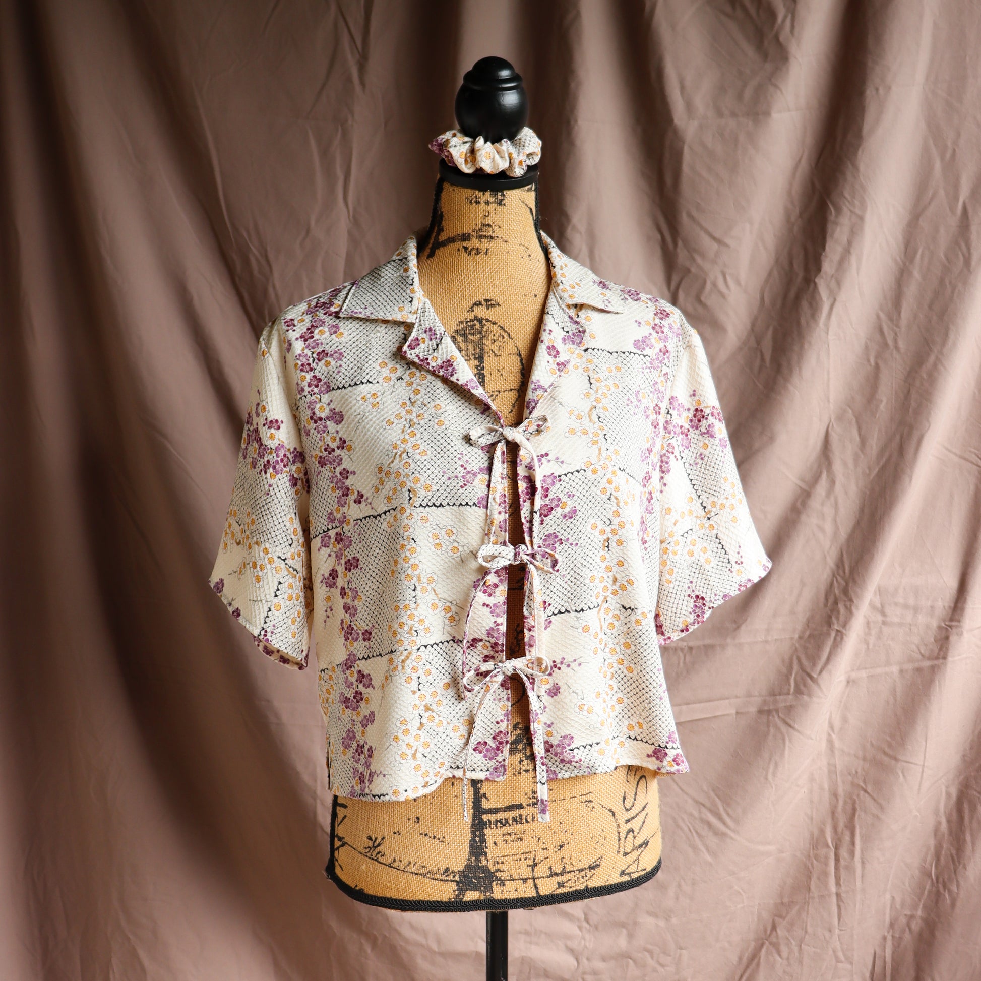 A silk shirt with front ties, made from secondhand kimono.