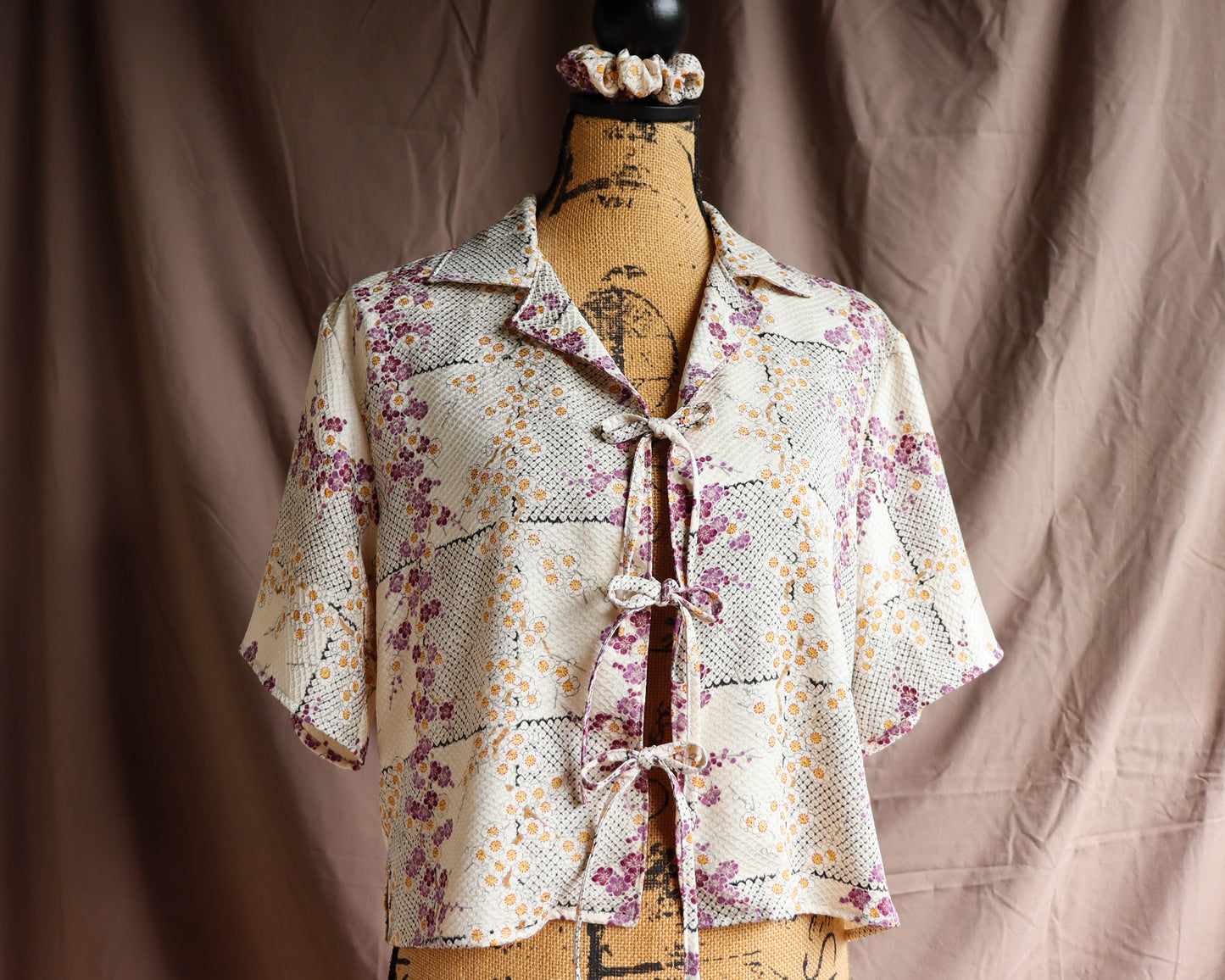 A silk shirt with front ties, made from secondhand kimono.