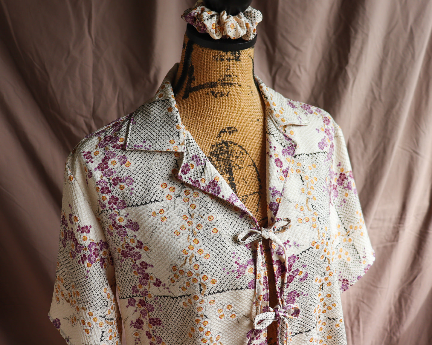 A silk shirt with front ties, made from secondhand kimono.