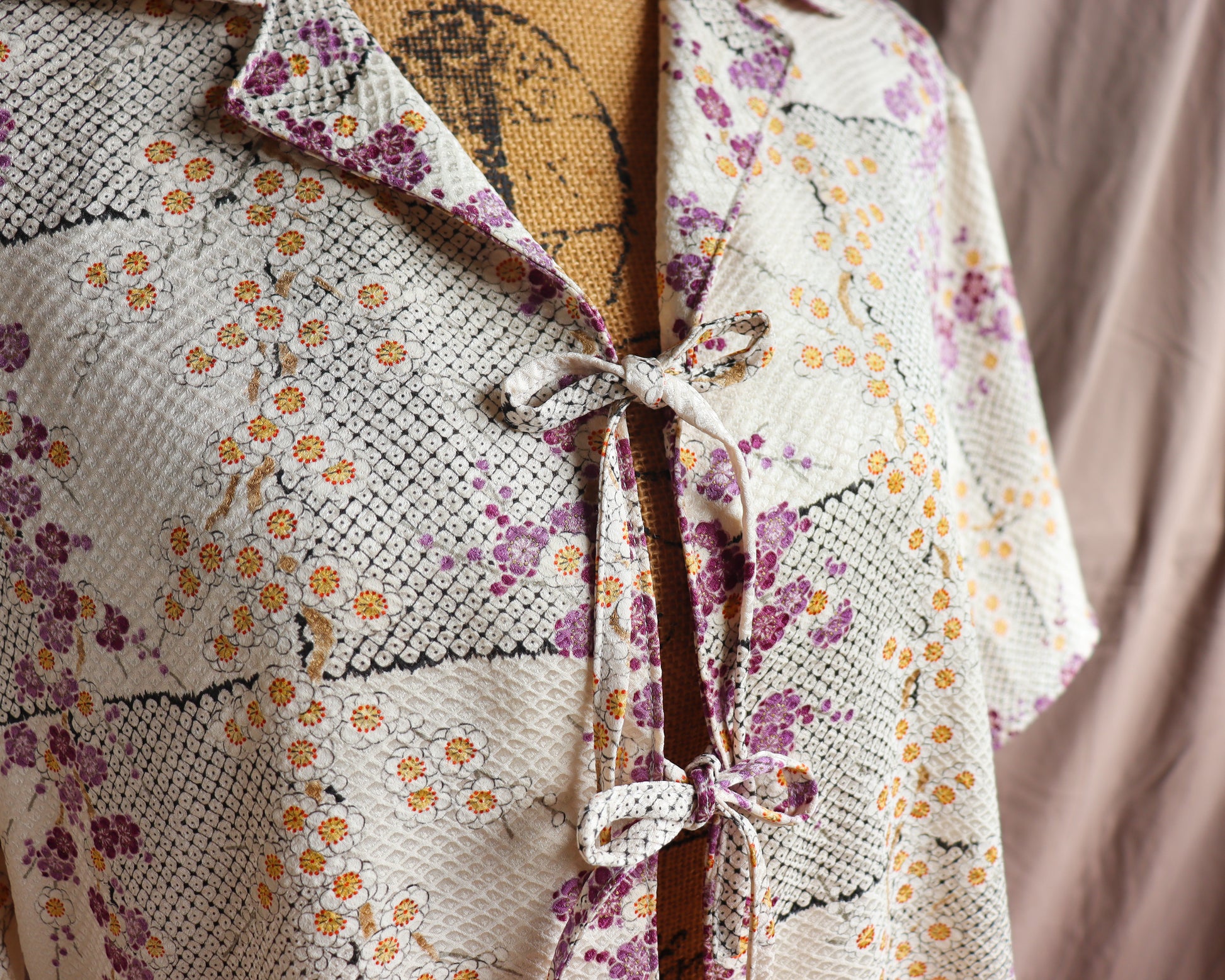 A silk shirt with front ties, made from secondhand kimono.