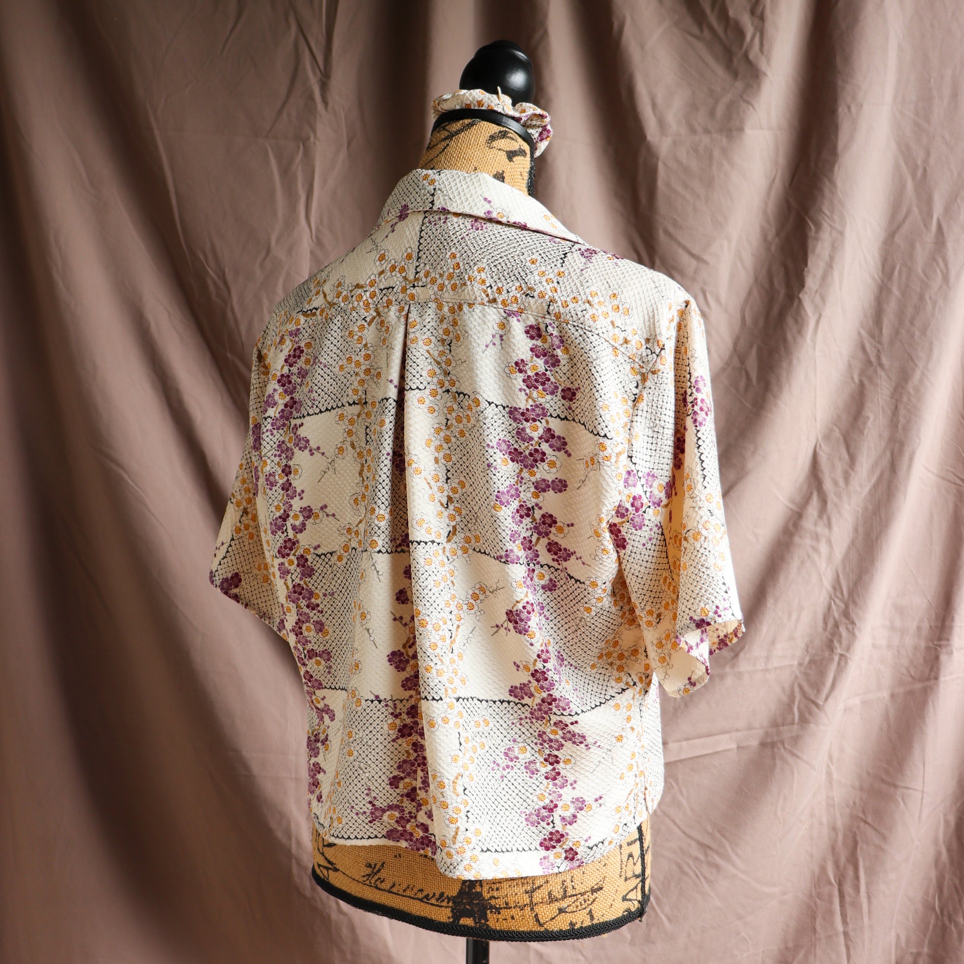 A silk shirt with front ties, made from secondhand kimono.