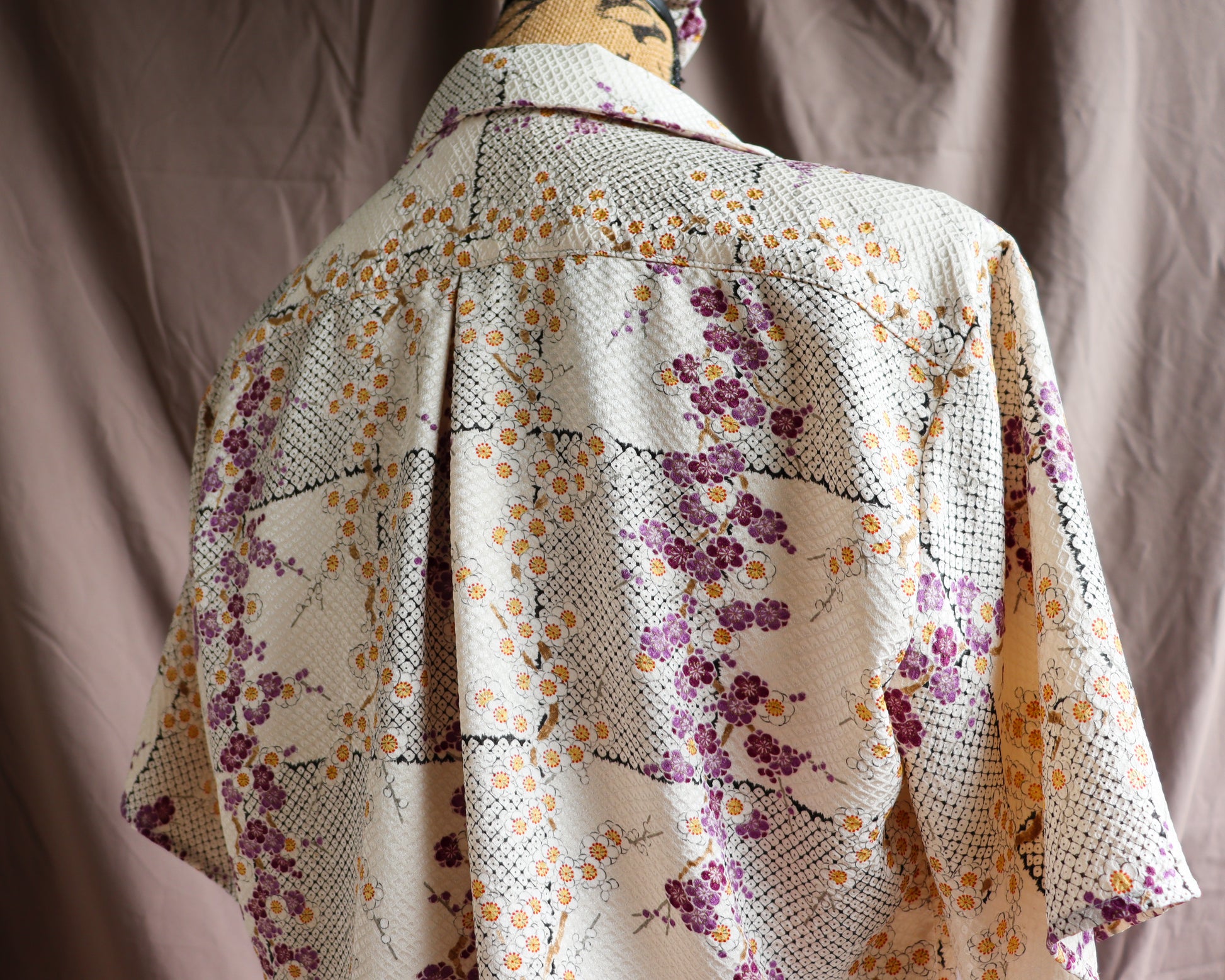 A silk shirt with front ties, made from secondhand kimono.