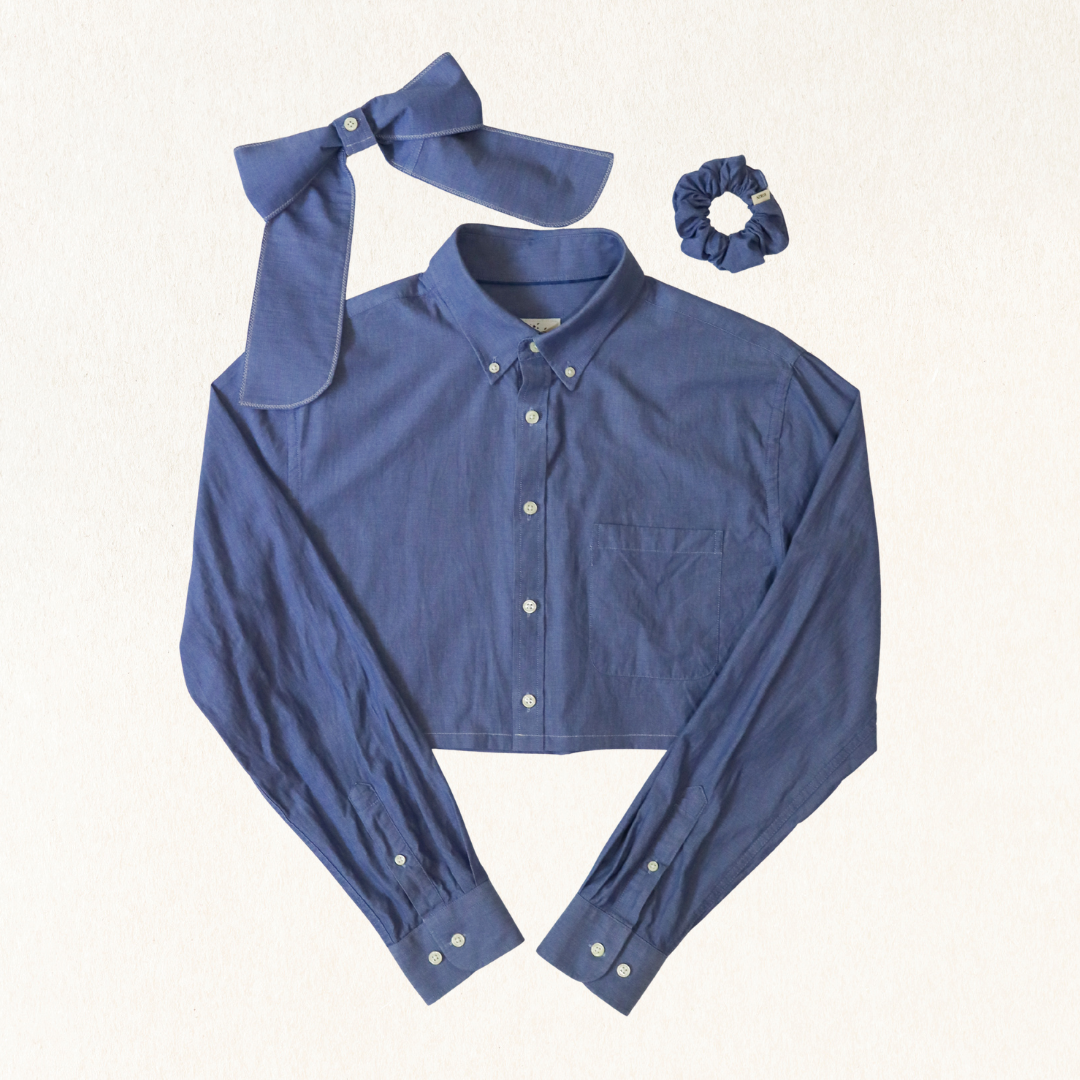Blue shirt with matching bow tie and scrunchie on a white background