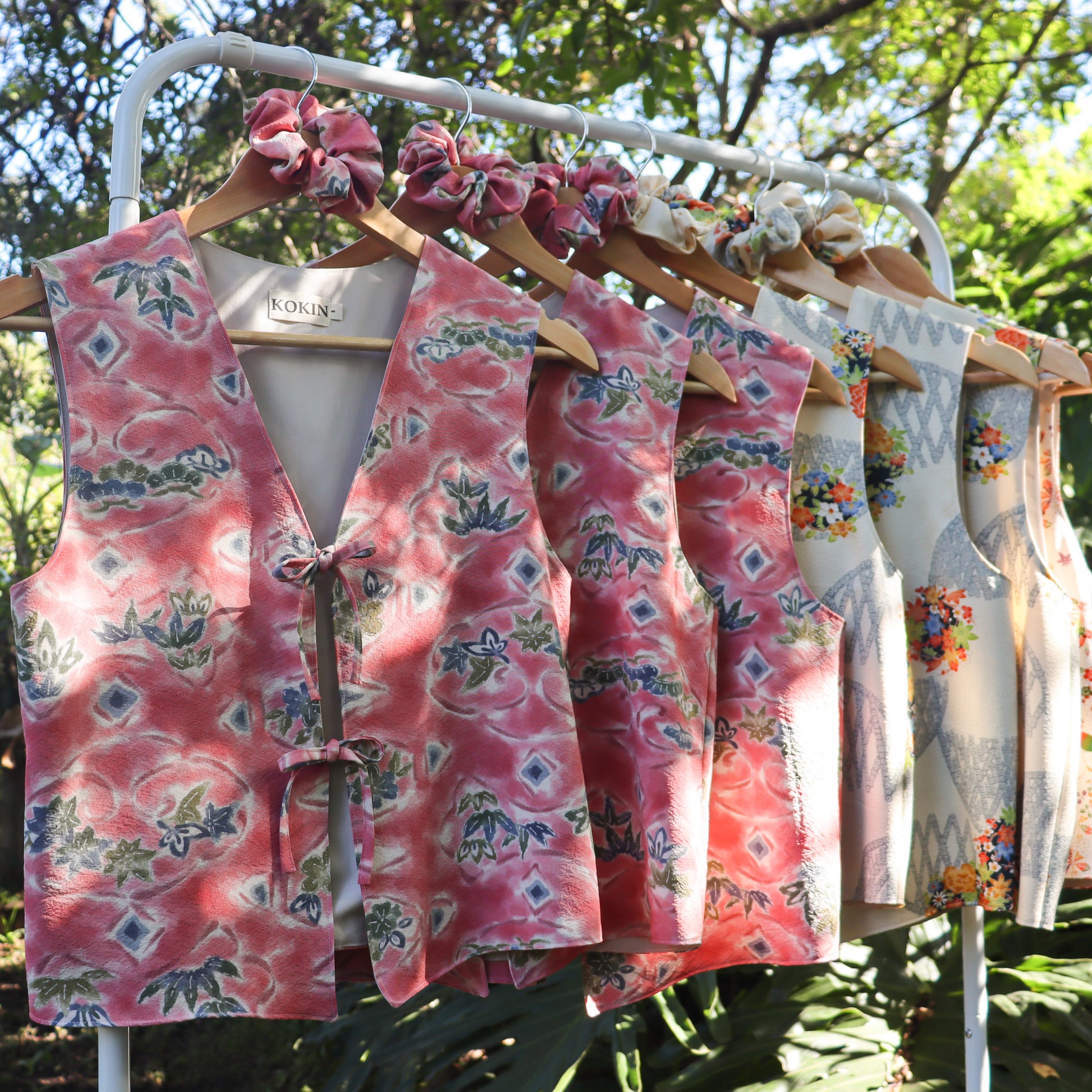 Women's front tie tops made from pre-loved silk kimono. Slow fashion. Upcycling. Fully lined with deadstock fabric. 