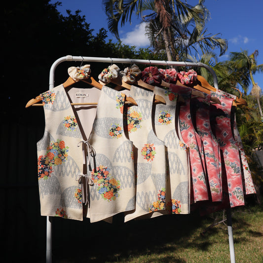 Women's vest tops with front ties. Made from pre-loved silk kimonos. Slow fashion, sustainable fashion, upcycling. Fully lined with deadstock fabric.